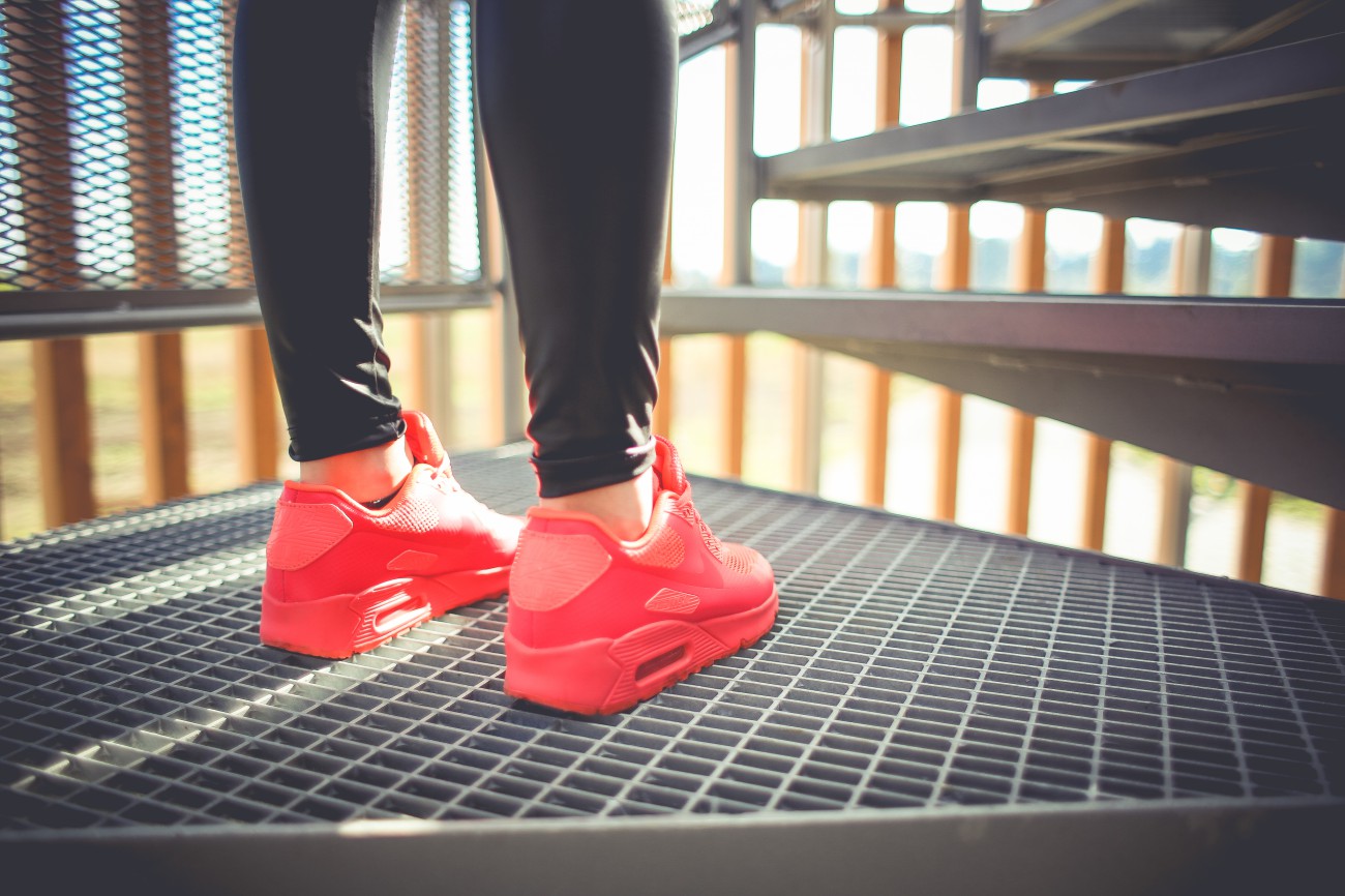 Woman with red sneakers